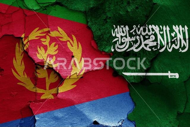 أعلام إريتريا والمملكة العربية السعودية مرسومة على جدار متصدع
