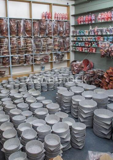 Natural stone kitchen bowls plates for sale in a shop, Najran Province, Najran, Saudi Arabia