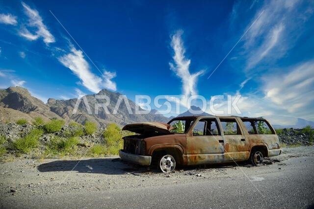 Burned car in abandoned area of Saudi Arabia