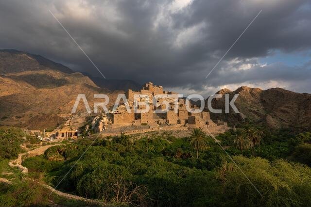 Dramatic clouds over historic Dhee Ayn marble village in the Asir region of Saudi Arabia
