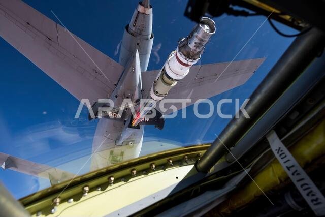 A U.S. Air Force 96th Bomb Squadron pilot positions a U.S. Air Force 2nd Bomb Wing B-52H Stratofortress behind a U.S. Air Force 60th Air Mobility Wing KC-10 Extender over Saudi Arabia in support of Bomber Task Force Europe 20-1, Nov. 1, 2019. The Stratofortress conducted a sortie to the U.S. Central Command area of operations in order to conduct interoperability training with Saudi partners in support of shared regional security interests. (U.S. Air Force photo by Tech. Sgt. Christopher Ruano)