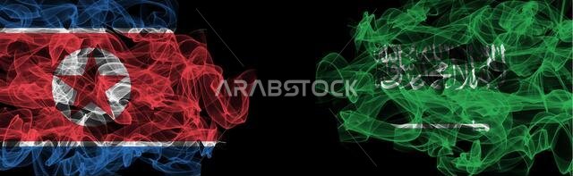Flags of North Korea and Saudi Arabia on Black background, North Korea vs Saudi Arabia Smoke Flags