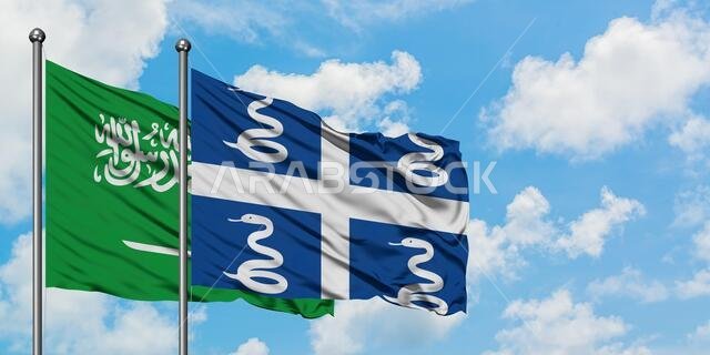 Saudi Arabia and Martinique flag waving in the wind against white cloudy blue sky together. Diplomacy concept, international relations.