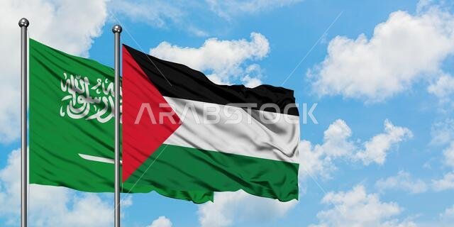 يرفرف علم المملكة العربية السعودية وعلم فلسطين معاً في مهب الريح أمام سماء زرقاء صافية تتلألأ فيها الغيوم البيضاء. مفهوم الدبلوماسية، العلاقات الدولية. يرفرف علم المملكة العربية السعودية وعلم فلسطين معاً في مهب الريح أمام سماء زرقاء صافية تتلألأ فيها الغيوم البيضاء. مفهوم الدبلوماسية، العلاقات الدولية.
