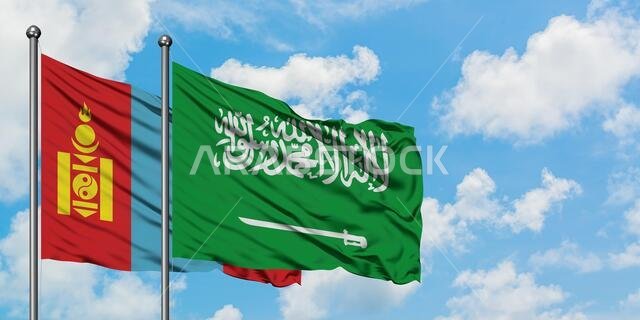 Mongolia and Saudi Arabia flag waving in the wind against white cloudy blue sky together. Diplomacy concept, international relations.