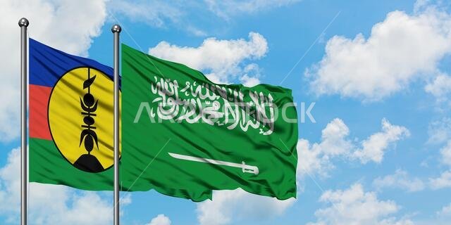 New Caledonia and Saudi Arabia flag waving in the wind against white cloudy blue sky together. Diplomacy concept, international relations.