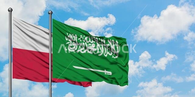 Poland and Saudi Arabia flag waving in the wind against white cloudy blue sky together. Diplomacy concept, international relations.