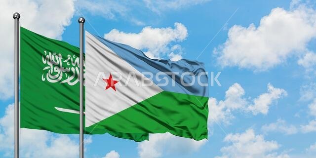 Saudi Arabia and Djibouti flag waving in the wind against white cloudy blue sky together. Diplomacy concept, international relations.