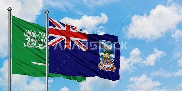 Saudi Arabia and Falkland Islands flag waving in the wind against white cloudy blue sky together. Diplomacy concept, international relations.