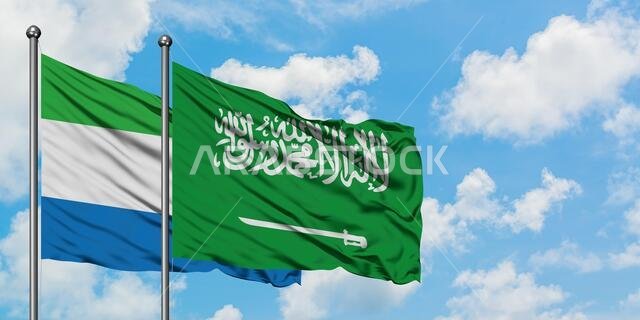 Sierra Leone and Saudi Arabia flag waving in the wind against white cloudy blue sky together. Diplomacy concept, international relations.