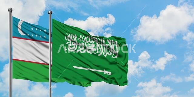 Uzbekistan and Saudi Arabia flag waving in the wind against white cloudy blue sky together. Diplomacy concept, international relations.
