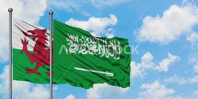 Wales and Saudi Arabia flag waving in the wind against white cloudy blue sky together. Diplomacy concept, international relations.