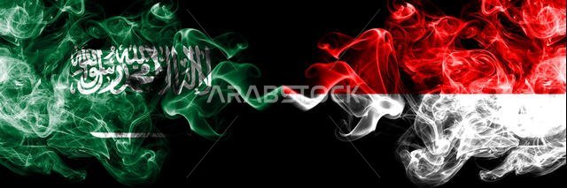 Saudi Arabia Kingdom vs Indonesia, Indonesian smoky mystic flags placed side by side. Thick colored silky smoke flags of Arabic, Arabian and Indonesia