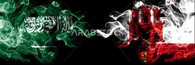 أعلام المملكة العربية السعودية وجبل طارق، أعلام دخانية غامضة موضوعة جنباً إلى جنب. أعلام دخانية سميكة ملونة حريرية من اللغة العربية وجبل طارق