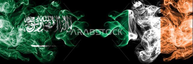 Saudi Arabia Kingdom vs Ireland, Irish smoky mystic flags placed side by side. Thick colored silky smoke flags of Arabic, Arabian and Ireland, Irish