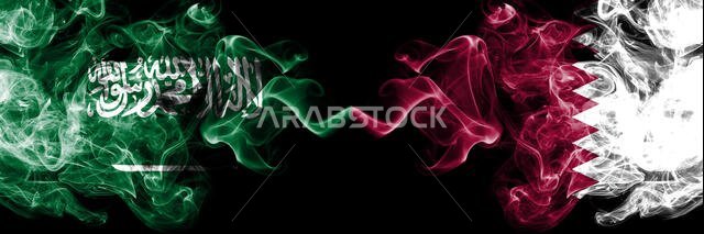 Saudi Arabia Kingdom vs Qatar, Qatari smoky mystic flags placed side by side. Thick colored silky smoke flags of Arabic, Arabian and Qatar, Qatari