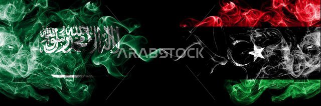 Saudi Arabia Kingdom vs Libya, Libyan smoky mystic flags placed side by side. Thick colored silky smoke flags of Arabic, Arabian and Libya, Libyan