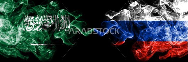 Saudi Arabia Kingdom vs Russia, Russian smoky mystic flags placed side by side. Thick colored silky smoke flags of Arabic, Arabian and Russia, Russian