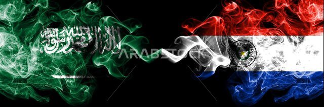 Saudi Arabia Kingdom vs Paraguay, Paraguayan smoky mystic flags placed side by side. Thick colored silky smoke flags of Arabic, Arabian and Paraguay,
