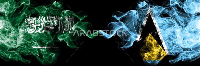 Saudi Arabia Kingdom vs Saint Lucia smoky mystic flags placed side by side. Thick colored silky smoke flags of Arabic, Arabian and Saint Lucia