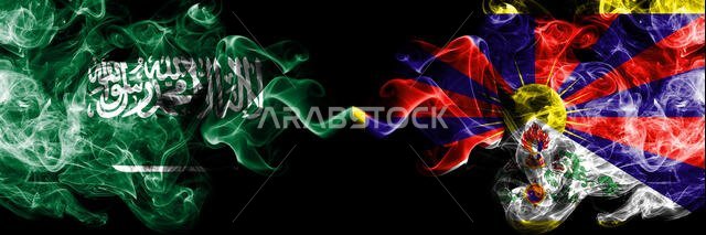 Saudi Arabia Kingdom vs Tibet, Tibetan smoky mystic flags placed side by side. Thick colored silky smoke flags of Arabic, Arabian and Tibet, Tibetan