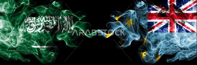 Saudi Arabia Kingdom vs Tuvalu, Tuvaluan smoky mystic flags placed side by side. Thick colored silky smoke flags of Arabic, Arabian and Tuvalu, Tuvalu