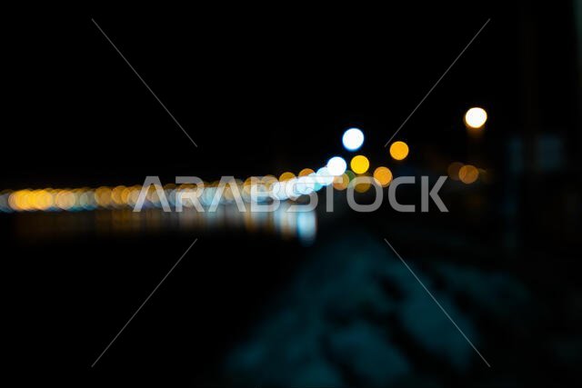Camera on tripod ready to shoot night photography. Photo taken at Dammam Corniche  Saudi Arabia