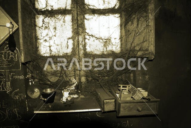an ancient mechanical workshop full of cobwebs