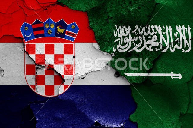 flags of Croatia and Saudi Arabia painted on cracked wall