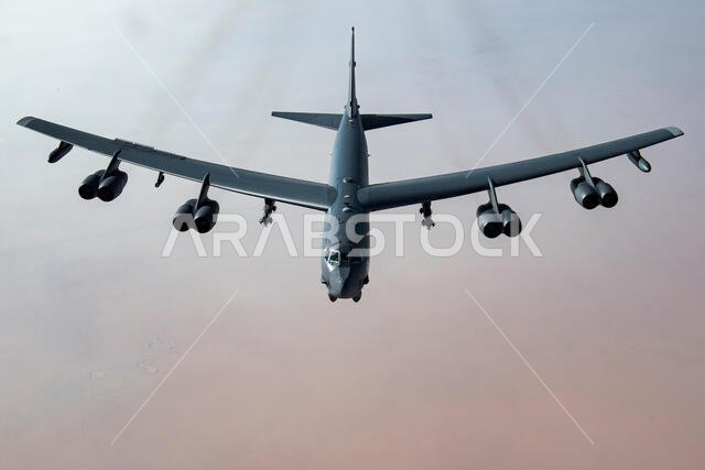 A United States Air Force B-52H Stratofortress, accompanied by four Saudi Arabian F-15C Eagles, conducts a low pass over Prince Sultan Air Base, Saudi Arabia, Nov. 1, 2019. The B-52H, deployed from Barksdale Air Force Base, La., is part of a Bomber Task Force operating out of RAF Fairford, England. The aircraft is a long-range strategic bomber capable of delivering massive amounts of precision weapons against any adversary. The bomber conducted a sortie to the U.S. Central Command area of operat