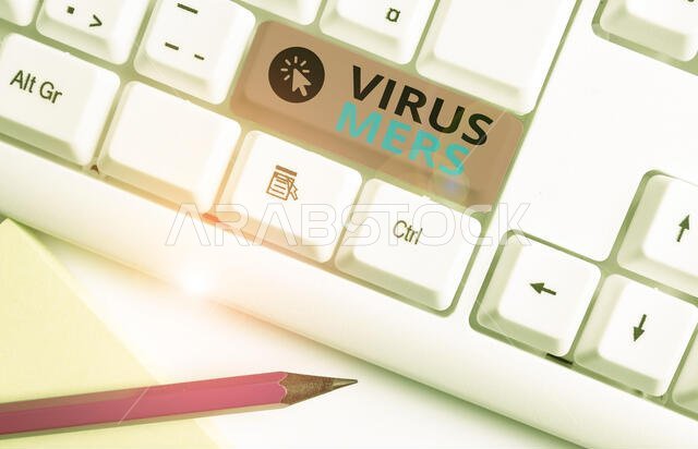 Conceptual hand writing showing Virus Mers. Concept meaning viral respiratory illness that first reported in Saudi Arabia White pc keyboard with note