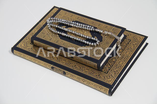 Holy islamic book Koran and rosary