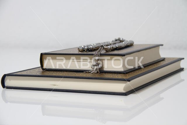 Holy islamic book Koran and rosary