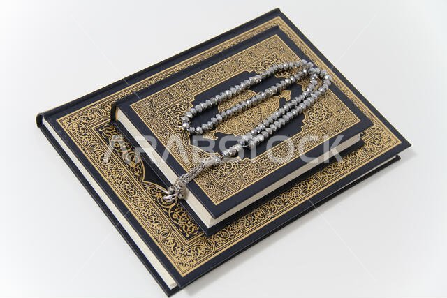 Holy islamic book Koran and rosary