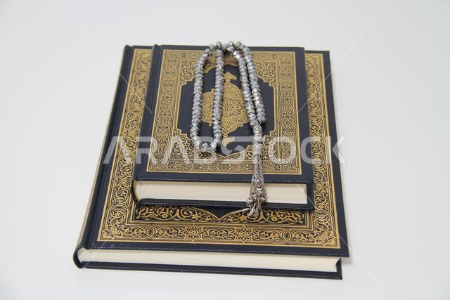 Holy islamic book Koran and rosary