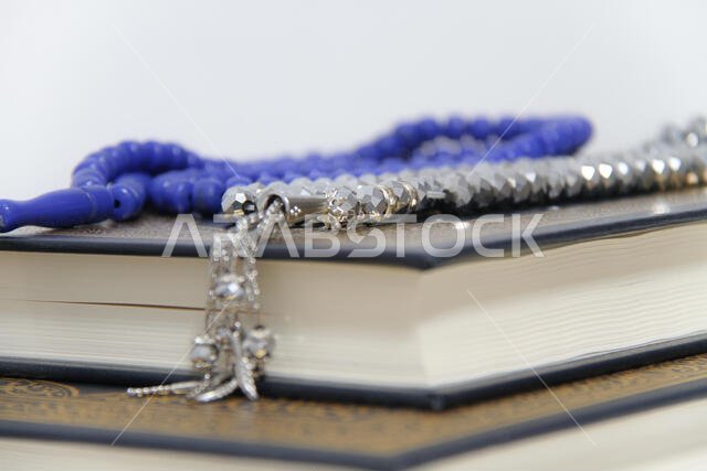 Holy islamic book Koran and rosary