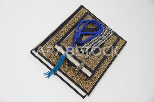 Holy islamic book Koran and rosary