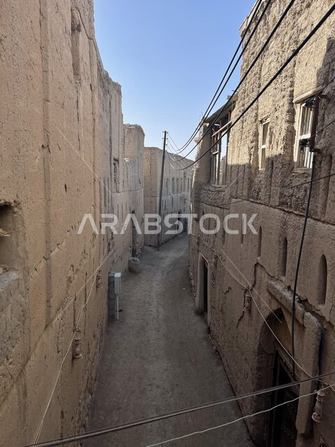 صورة لمباني طينية قديمة في ولاية رستاق بسلطنة عمان ، معالم تاريخية و أثرية قديمة ، معالم سياحية ، مباني أثرية قديمة ، بيوت تاريخية قديمة ، تجمعات سكنية قديمة في عمان ، مباني تراثية