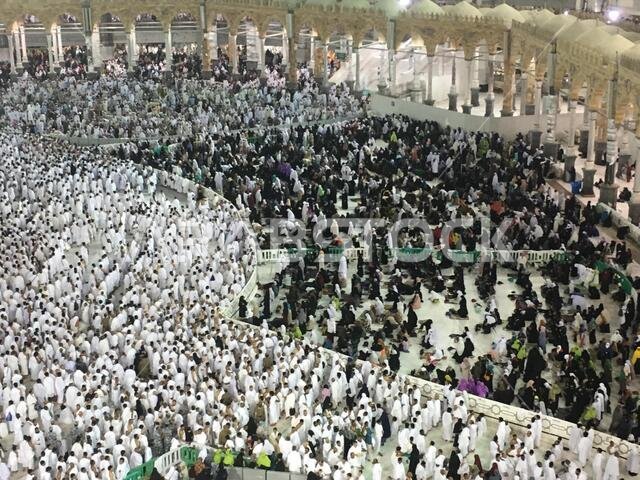 MECCA, SAUDI ARABIA, March 2018 - Muslim pilgrims from all over the world gathered to perform Umrah at the Haram Mosque in Mecca, Saudi Arabia;