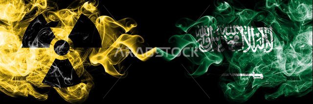 Saudi Arabia, Arabian vs nuclear smoky mystic flags placed side by side. Thick colored silky smokes combination of Saudi Arabia, Arabian flag and radi