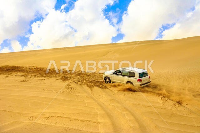 Khor al Udaid, Qatar - February 19, 2019: Offroad desert safari, dune bashing at inland sea near Qatar and Saudi Arabian, Persian Gulf, Middle East
