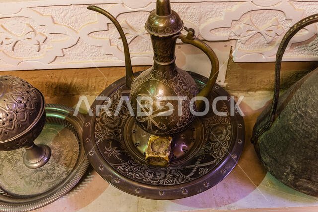 Vintage Saudi coffee pot and tray with artistic engravings
