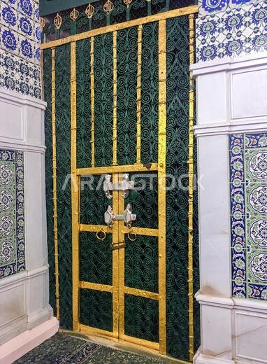 MEDINA, SAUDI ARABIA - JUNE 24, 2019: The tomb of the Islamic prophet Muhammad and tomb door on June 24, 2019 in Madinah, Saudi Arabia. His grave was