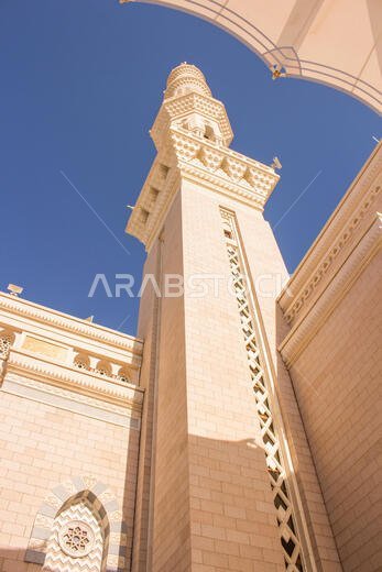 MADINAH, SAUDI ARABIA - AUGUST 2019 : Muslim pilgrims visiting the beautiful Nabawi Mosque destination, the Prophet mosque which has great architectur