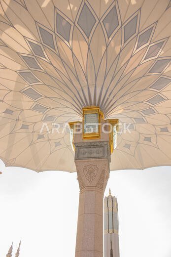 MADINAH, SAUDI ARABIA - AUGUST 2019 : Muslim pilgrims visiting the beautiful Nabawi Mosque destination, the Prophet mosque which has great architectur