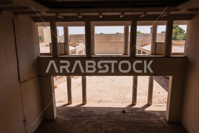 A garage and a view of the backyard of the abandoned luxury villa in Riyadh
