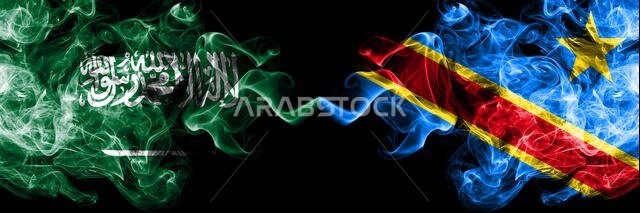 Saudi Arabia Kingdom vs Democratic Republic of the Congo smoky mystic flags placed side by side. Thick colored silky smoke flags of Arabic, Arabian an