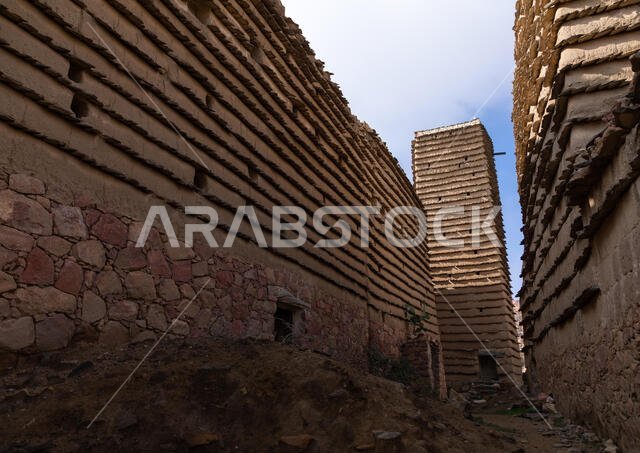 Stone and mud houses and watchtower with slates in al Khalaf village, Asir province, Sarat Abidah, Saudi Arabia