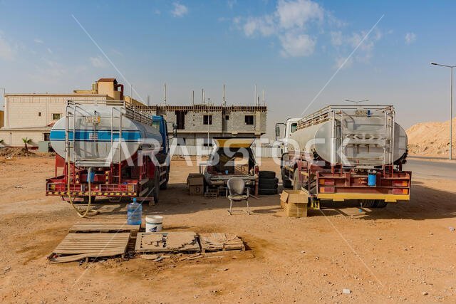 Water seller in empty corner lot in Riyadh, Saudi Arabia