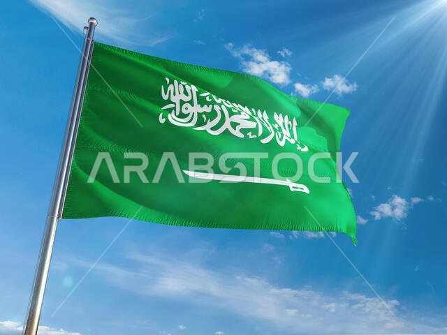 Saudi Arabia National Flag Waving on pole against sunny blue sky background. High Definition